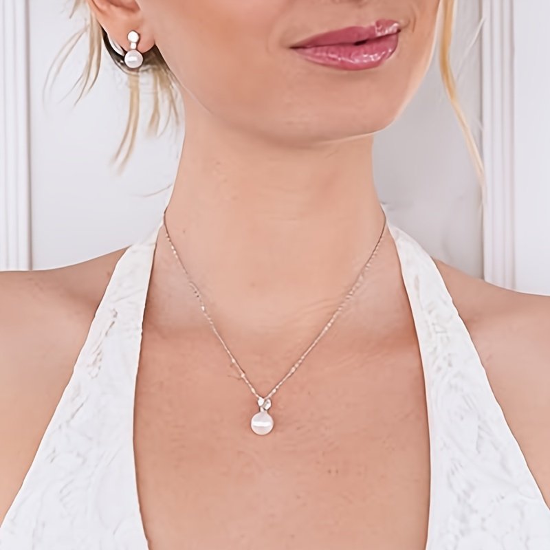 Pearl pendant necklace and earring set